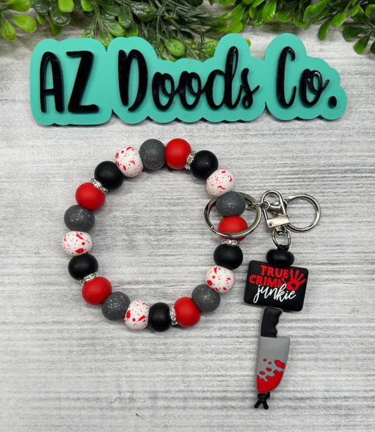 True Crime Junkie Wristlet With Removable Keychain